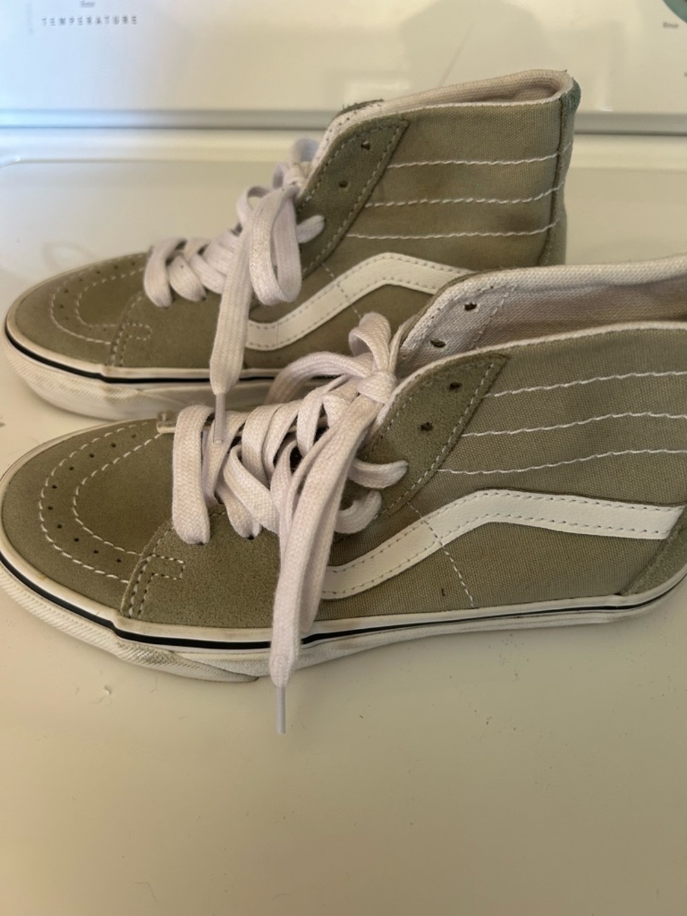Vans High-Top Sneakers in Cream and White